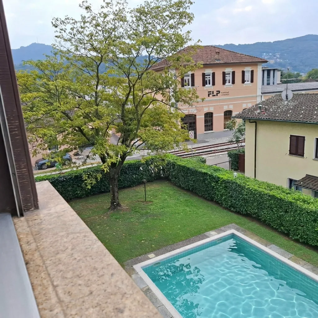 Bright 3.5-room apartment with pool in Agno