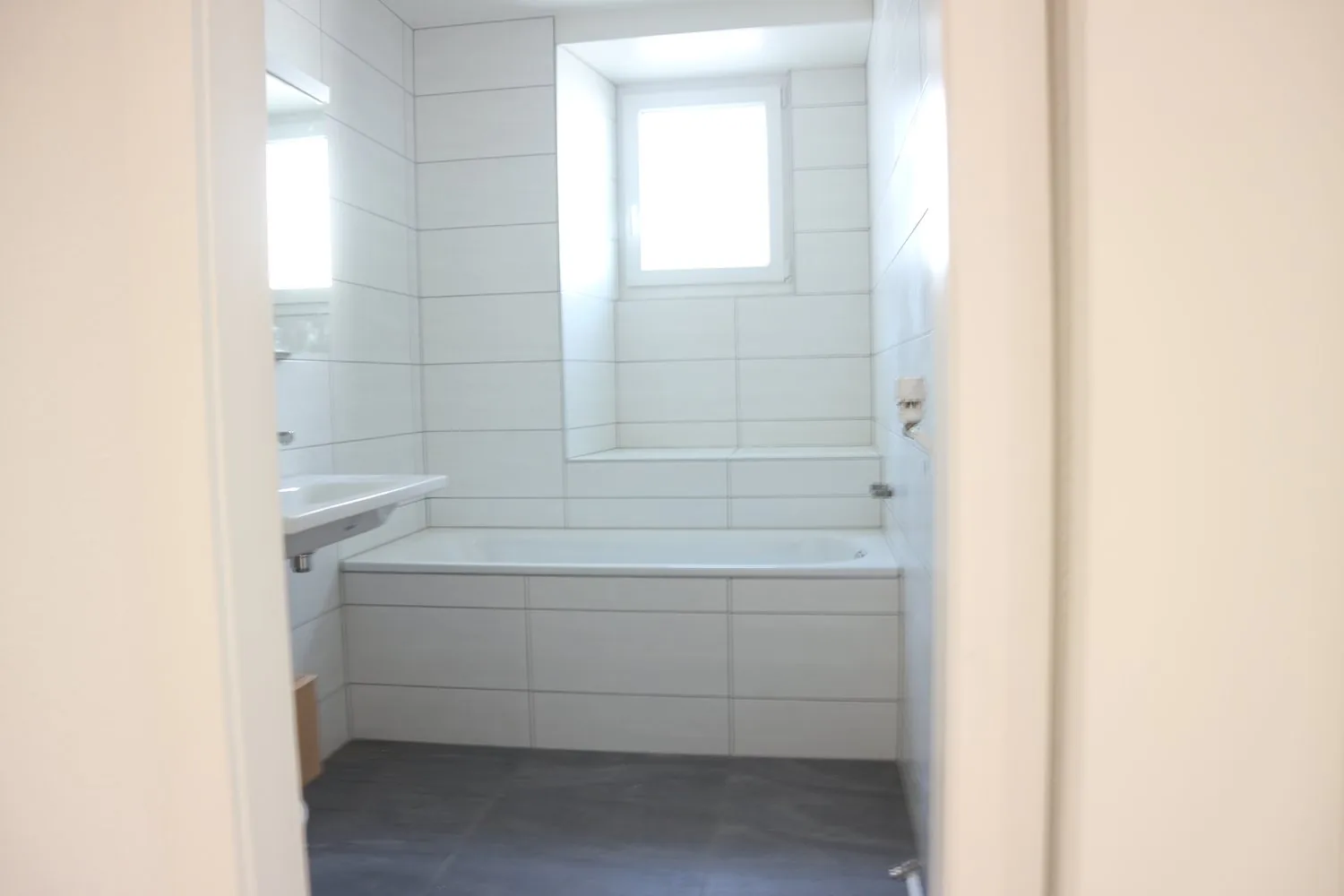 Immeuble de rapport de 2 locaux commerciaux et de 5 appartements