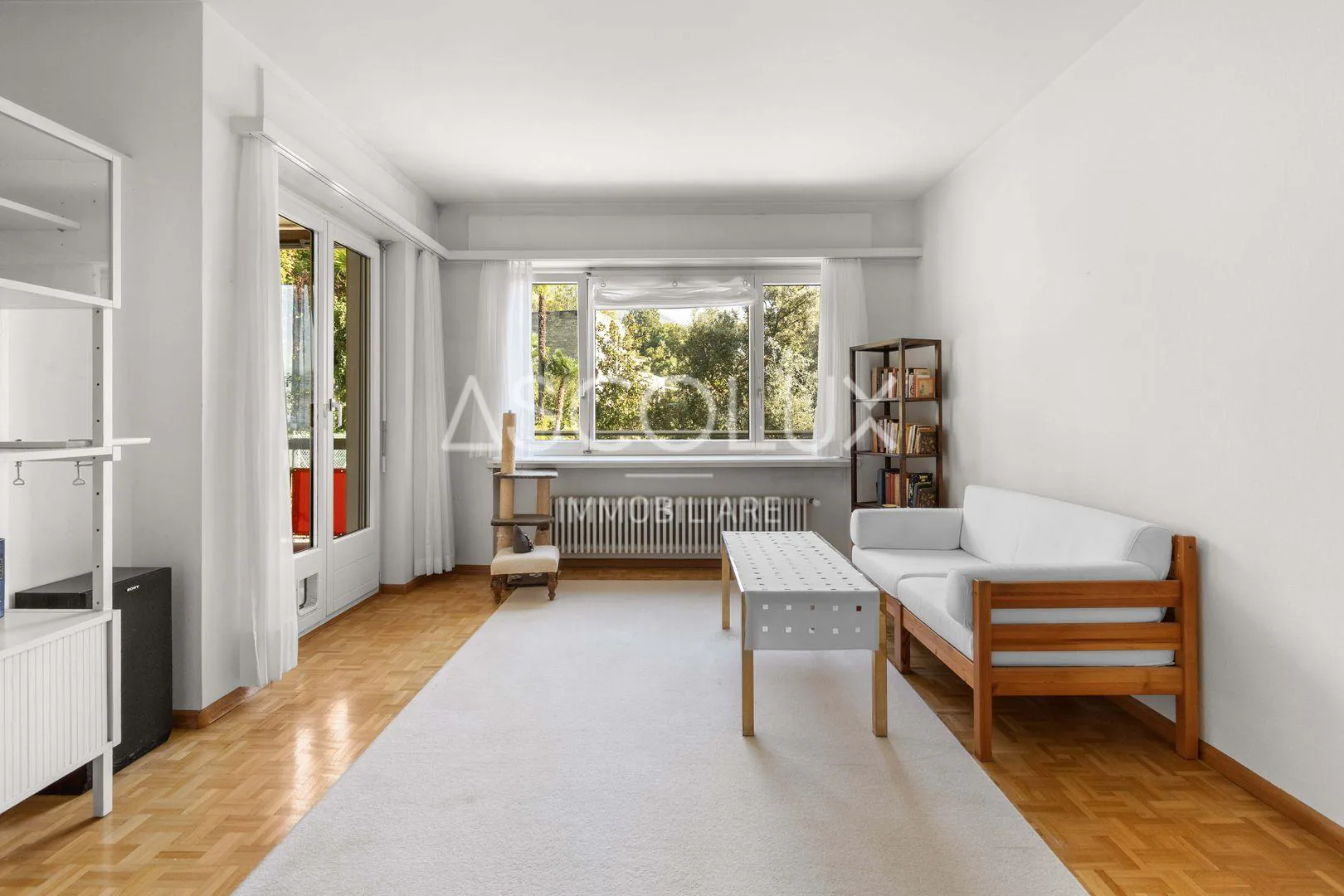 Appartement spacieux 2.5 pièces avec place de parking incluse, dans une résidence avec piscine intérieure et sauna