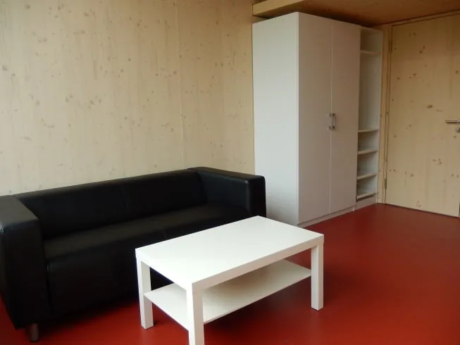 Double-story furnished room with community space!