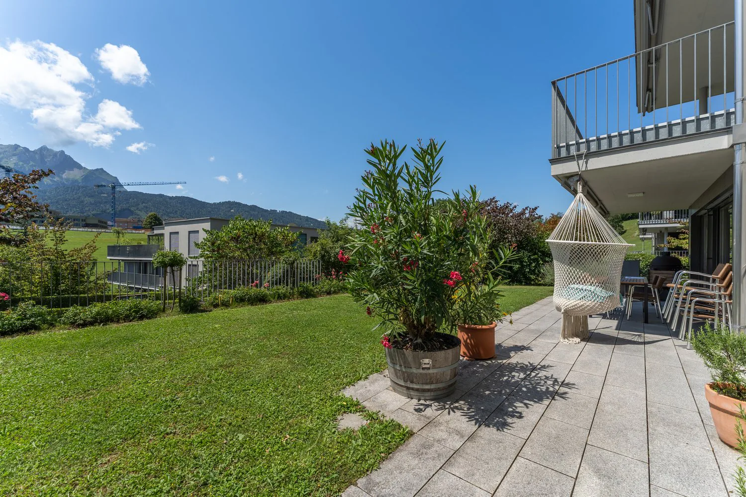 Flexible living with a grand garden terrace and Pilatus view