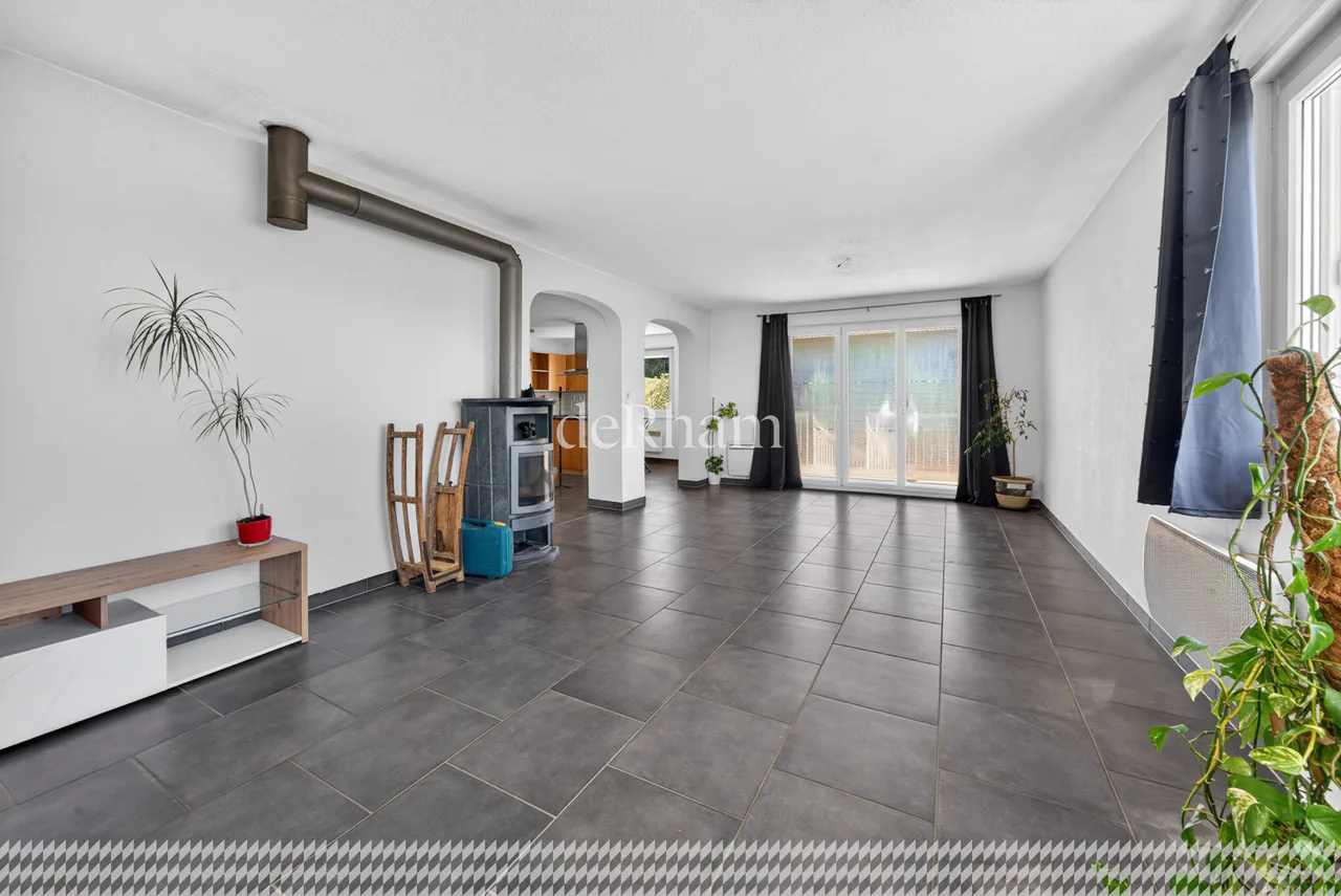 Duplex of 6.5 rooms with balcony, terrace, and garden
