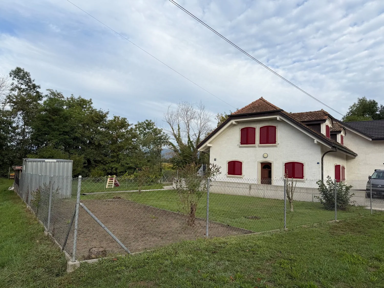Villa mitoyenne avec jardin située à Yvonand dans quartier tranquille