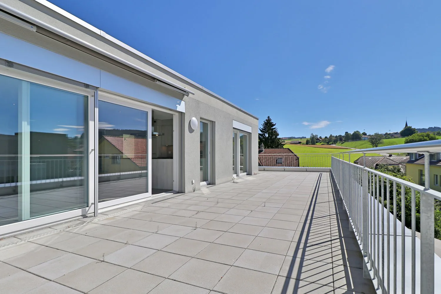 Appartements mansardés modernes avec vue panoramique à Biglen