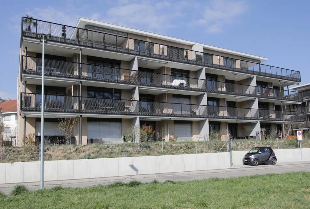 Modern apartment with garden seating and private laundry room