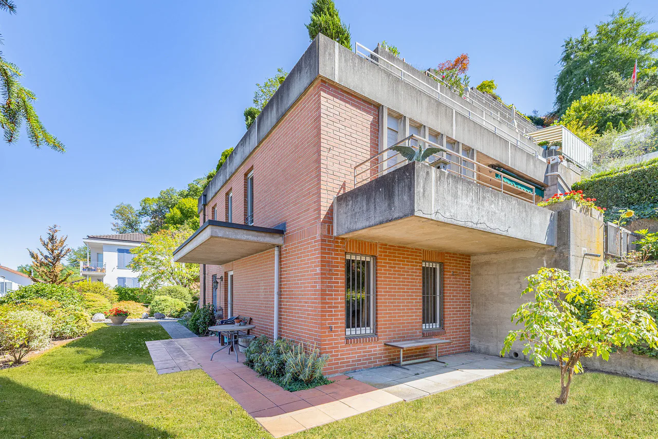 Stilvoll wohnen in einem Terrassenhaus mit eigenem Garten