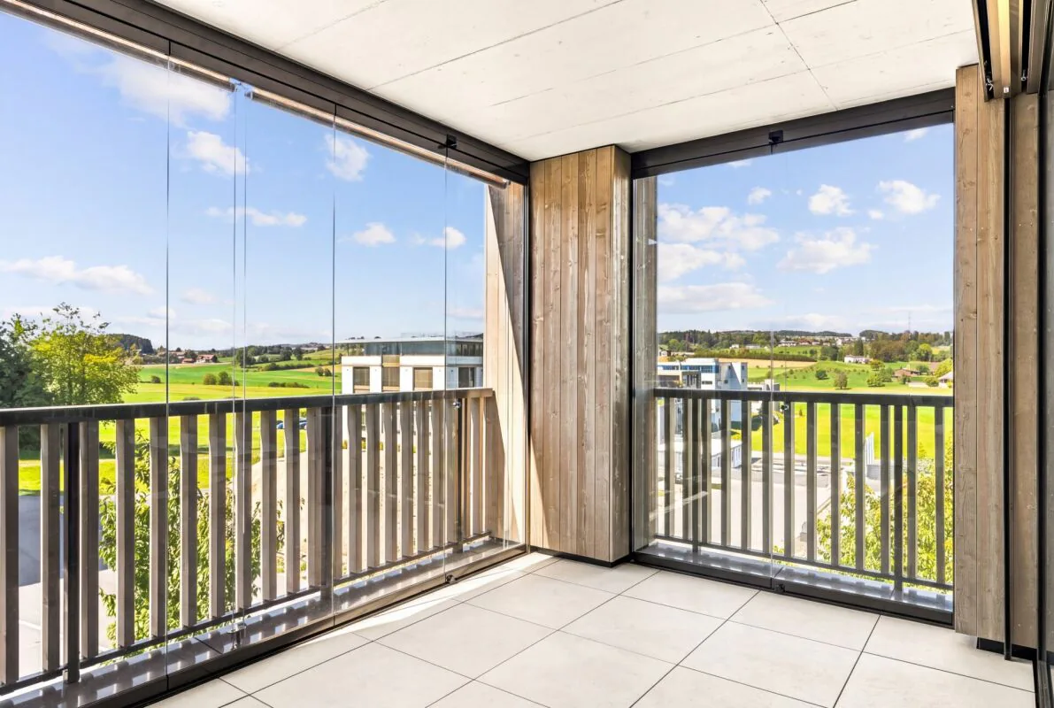Habitation moderne avec deux balcons dans le Rütipark Rain