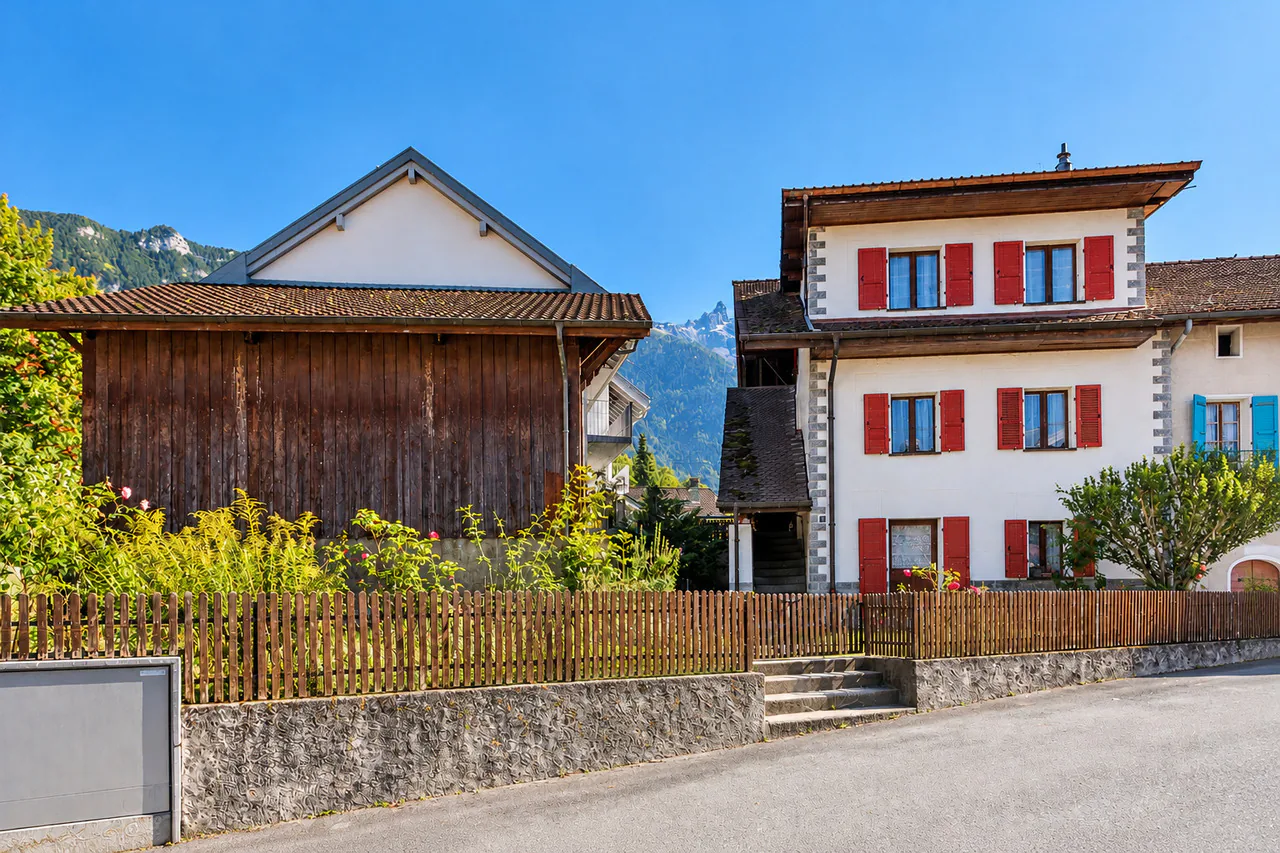 Haus im Dorfstil mit Scheune und Garten in Bex