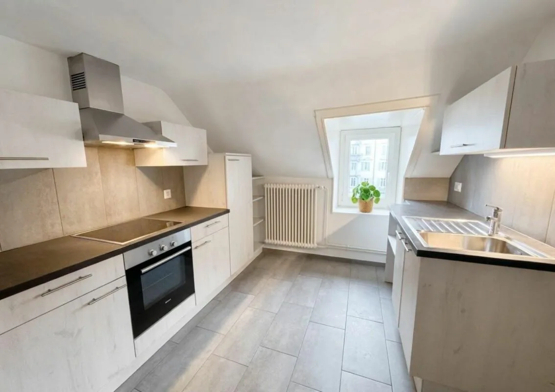 Von Charme unter dem Dach - 3.5 Zimmer mit 90 m² im Herzen von La Chaux-de-Fonds