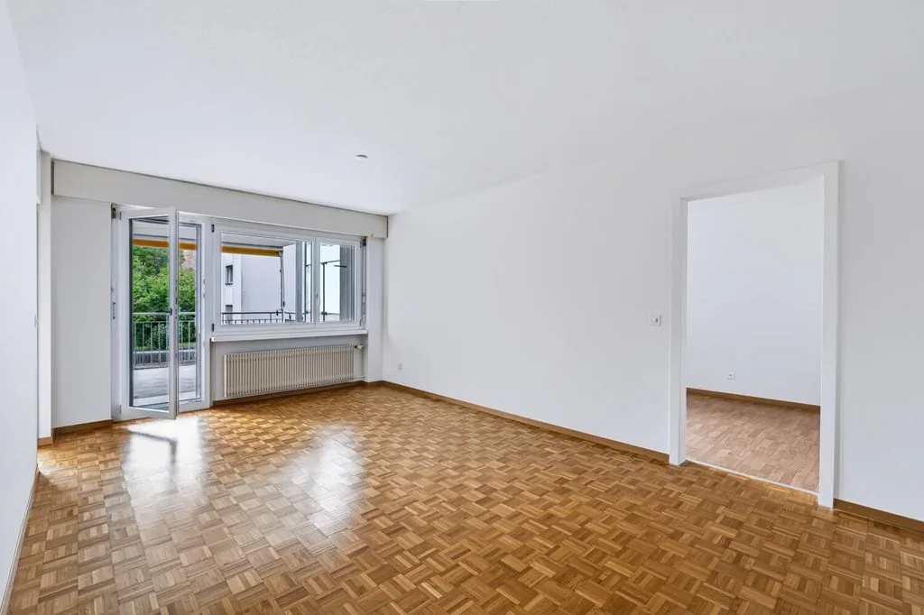 With elevator, dishwasher, covered balcony and much more!