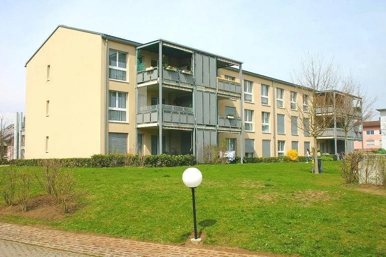 Grand appartement 2.5 pièces à 59 m2 au 1er étage avec balcon