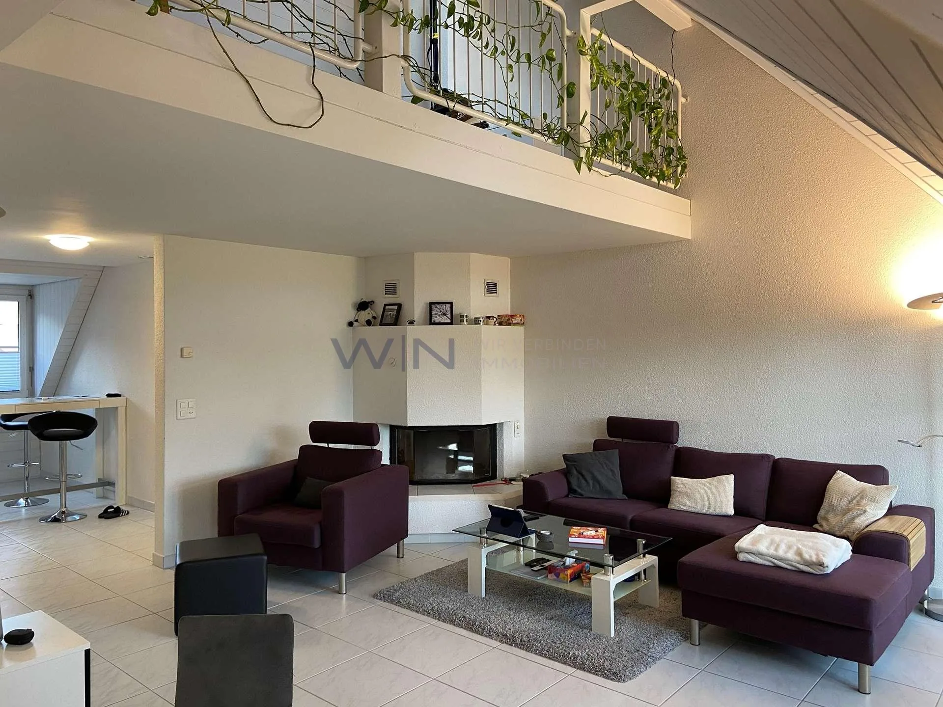 Atrium, Fireplace and two Balconies