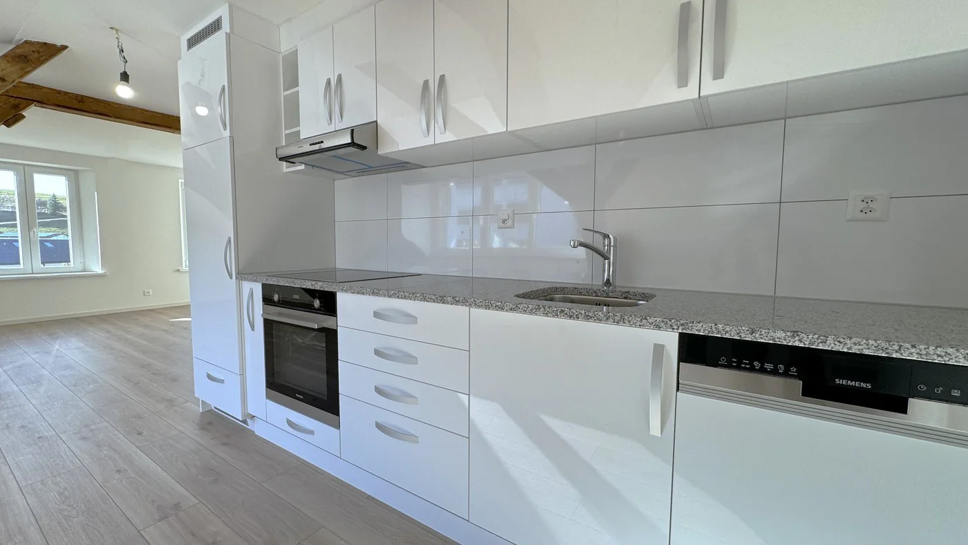 Charmant appartement en attique de 3 pièces