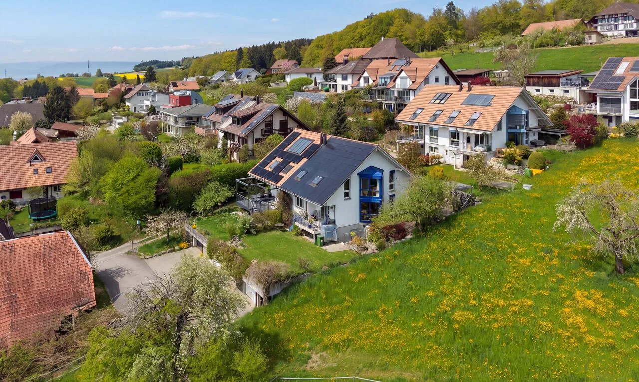 Family paradise with a far-reaching view, garden idyll, and potential for expansion
