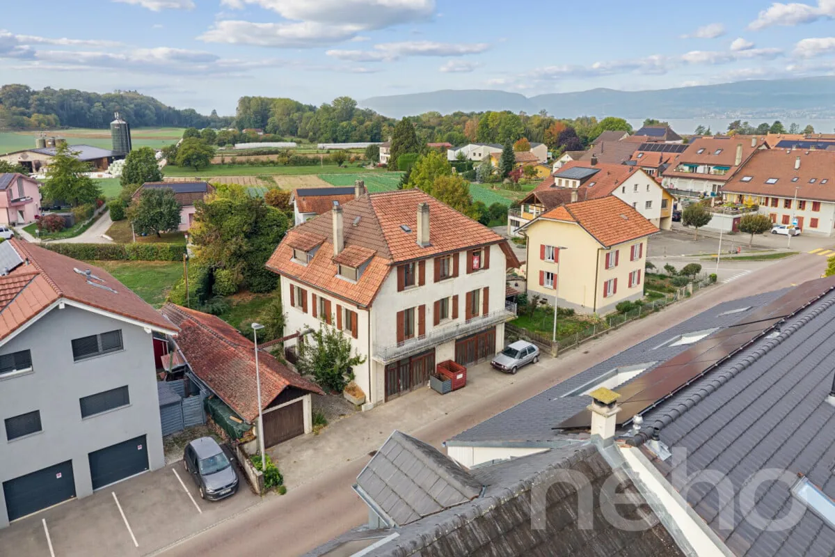 Edificio: 2x 4,5 locali + studio + grande garage e superficie ufficio