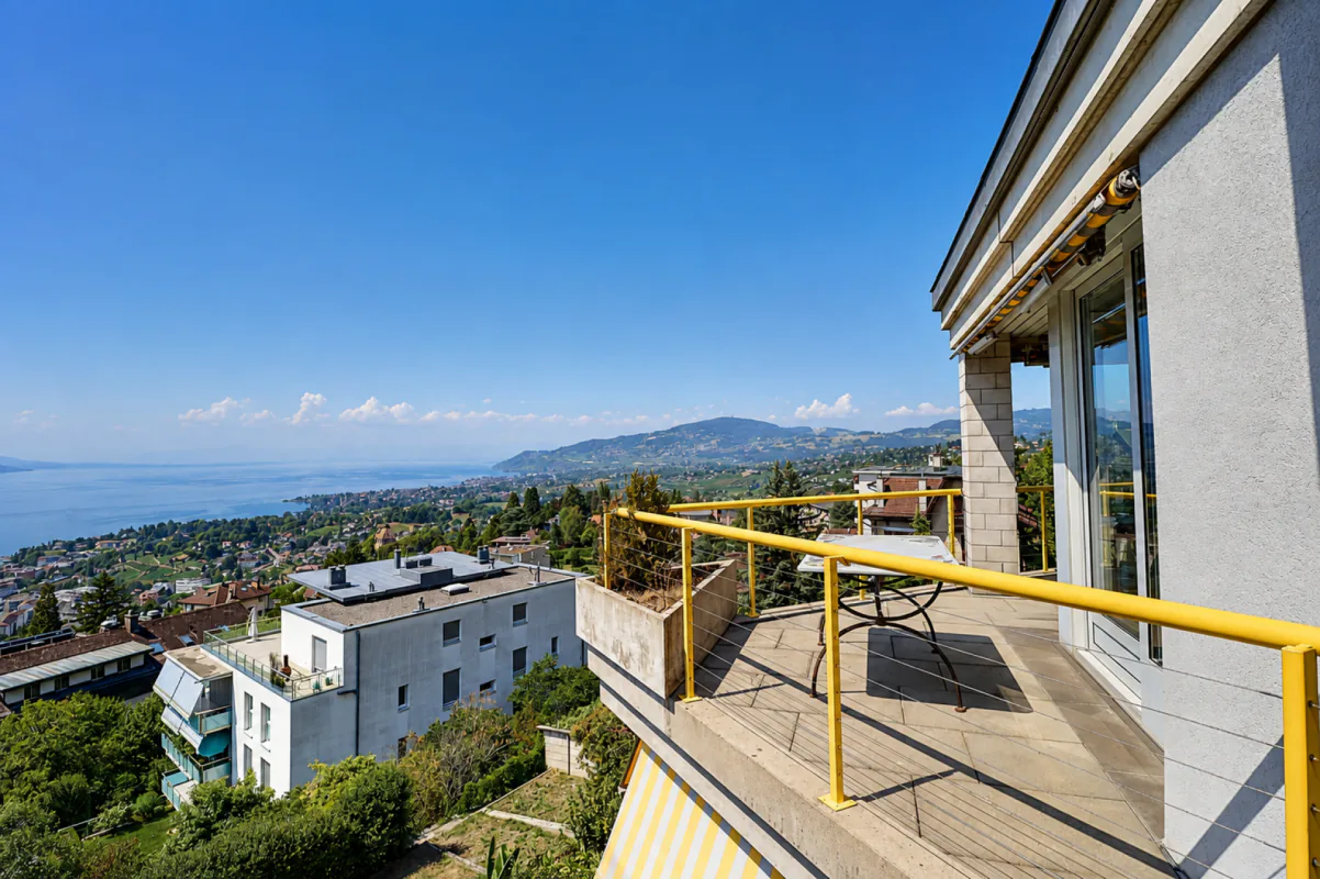 Attico eccezionale con vista panoramica sul lago e le montagne