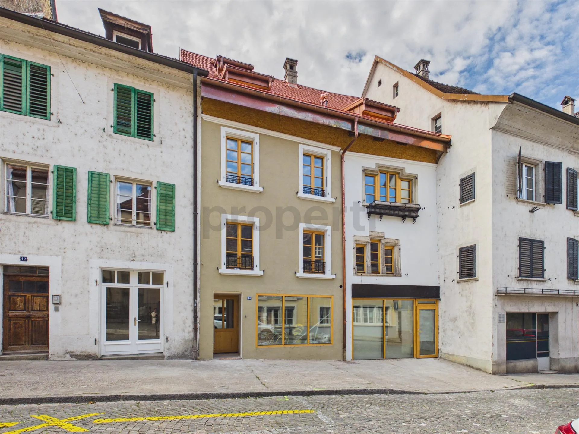 Gemischt genutztes Gebäude im Herzen der Altstadt von Porrentruy: Komplettsanierung im Gange, Schlüsselübergabe