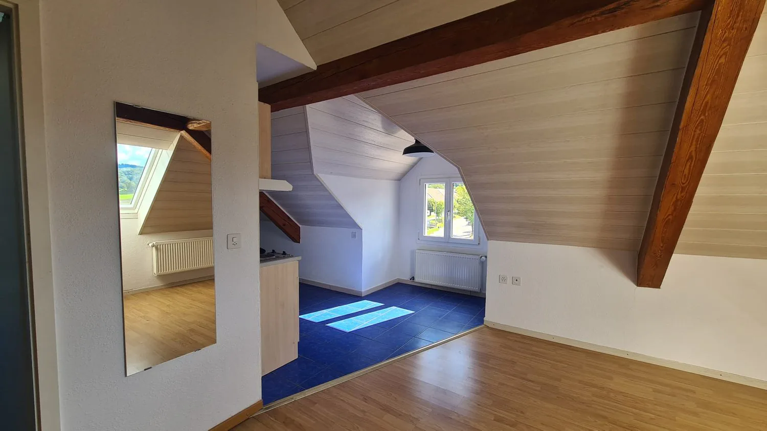 Charming mansard studio for rent in Cornol