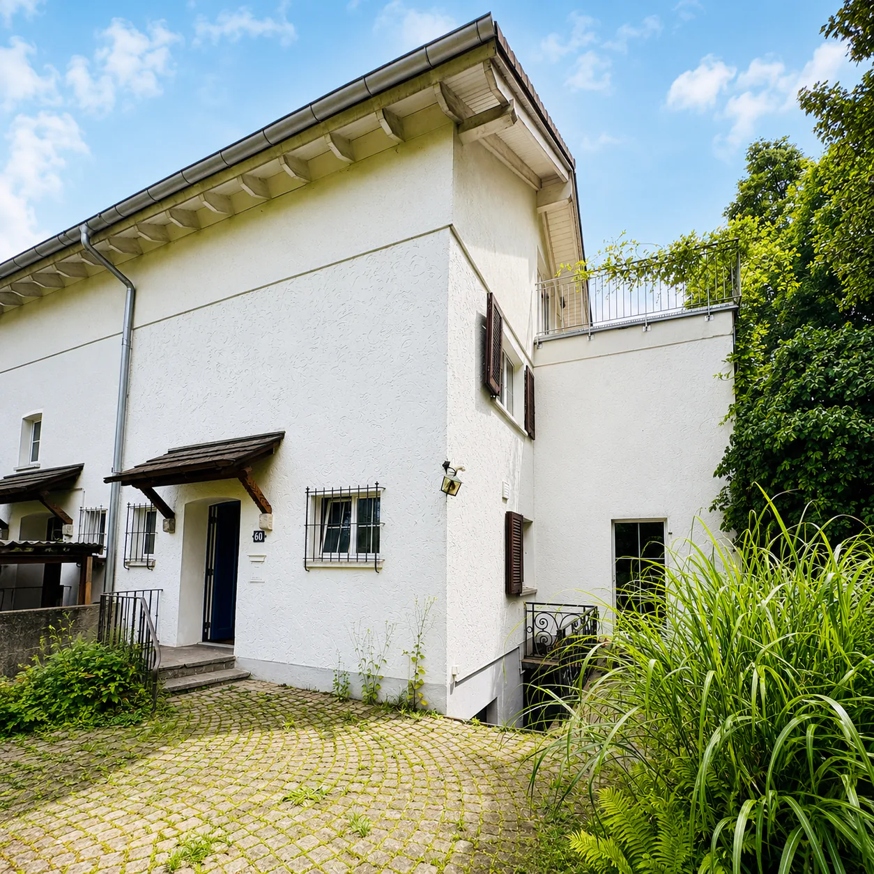 Charming 5.5-room two-family house with garden in the popular Triemli quarter