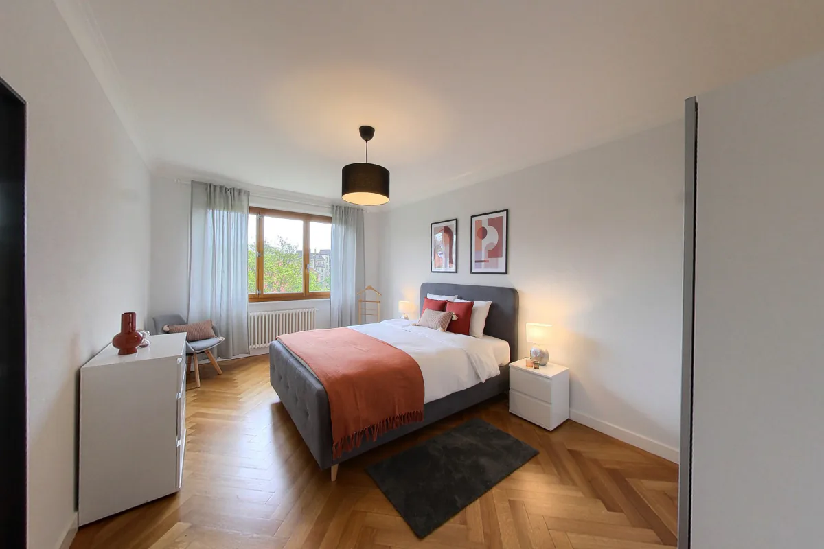 Geräumige 2-Zimmer-Wohnung mit Balkon und Flussblick in Genf