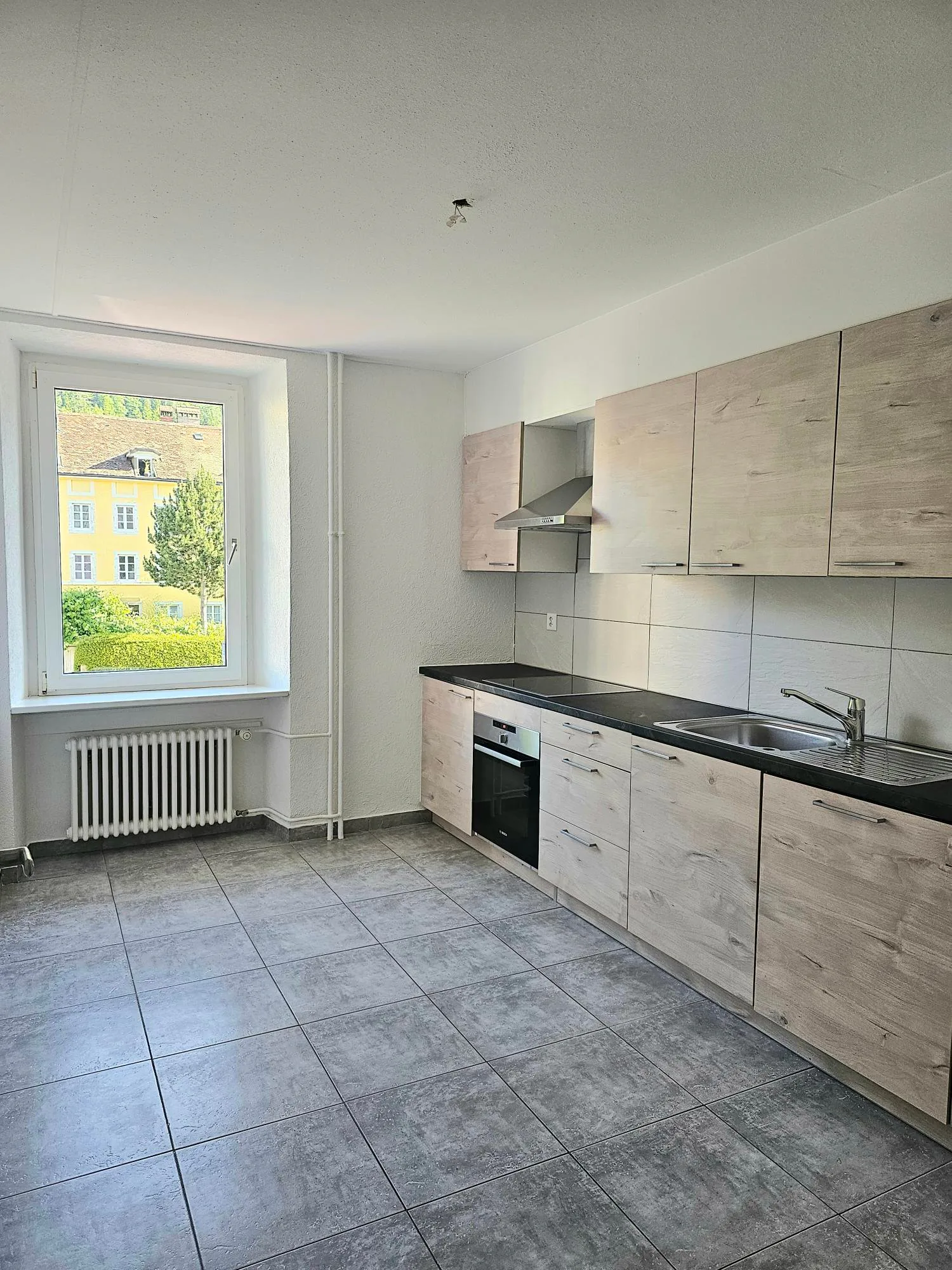 Renovated 4-room apartment in the village center