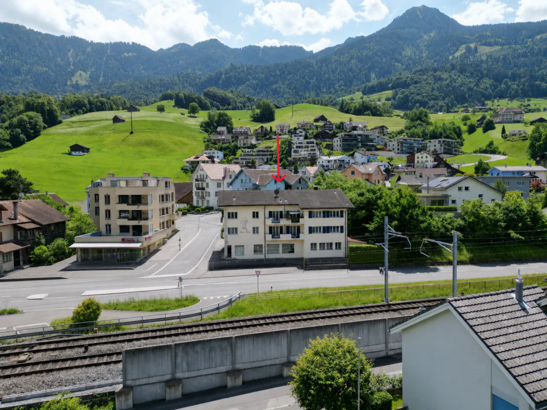 Apartment building with 4 residential units and a commercial space in Unterterzen SG
