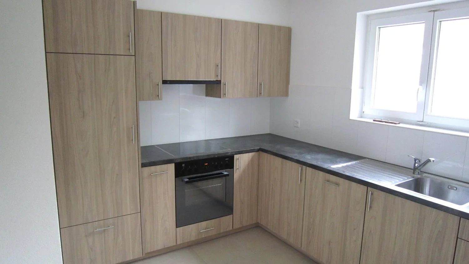 Wohnung mit 3 Zimmern und Balkon im Erdgeschoss