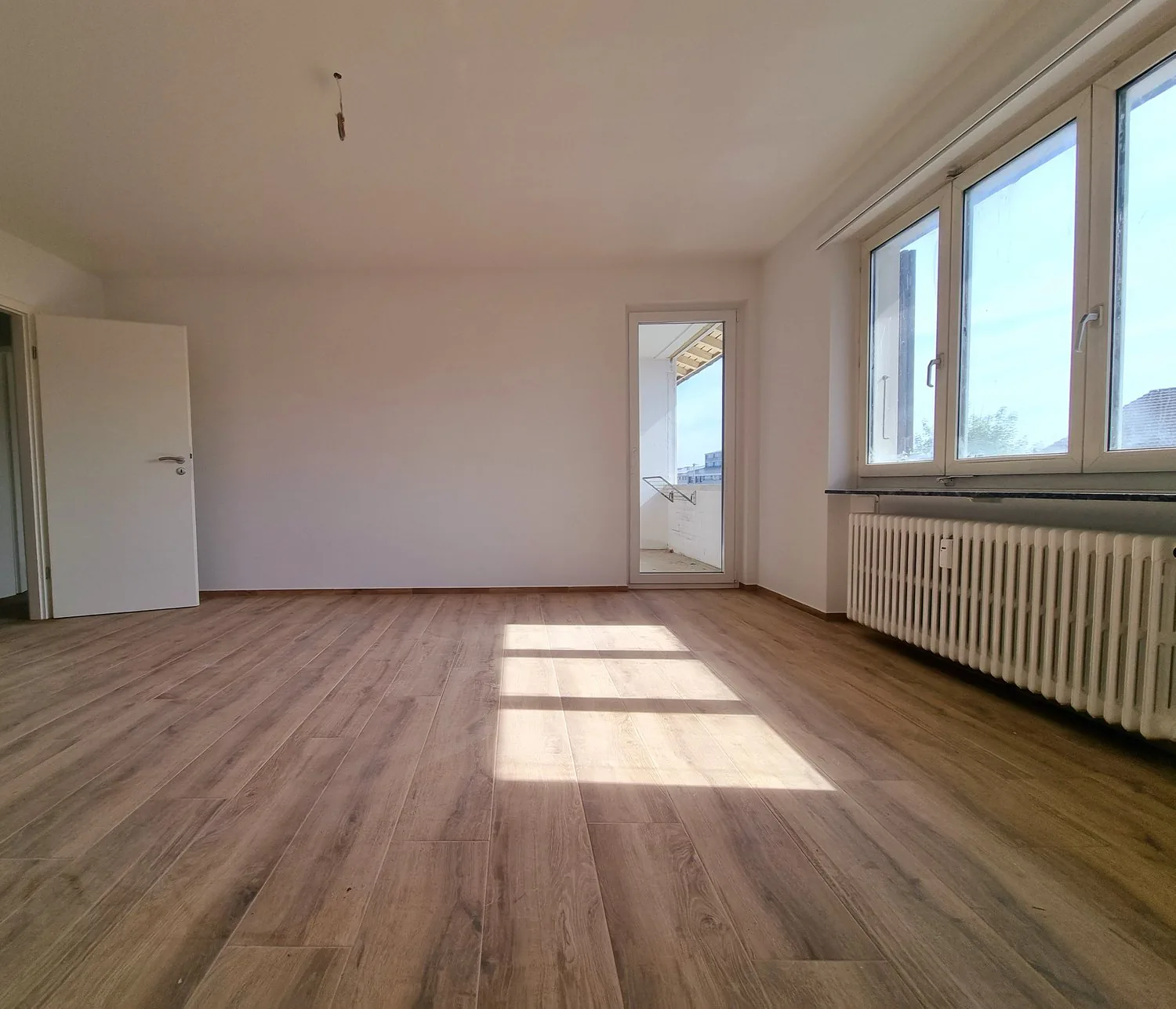 Bright, renovated 3.5-room apartment with balcony in Münchenstein