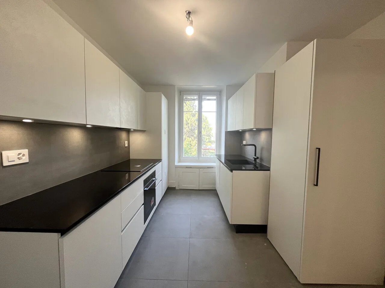 Magnifico 3.5 locali ristrutturato con balcone e giardino a Yverdon-les-Bains