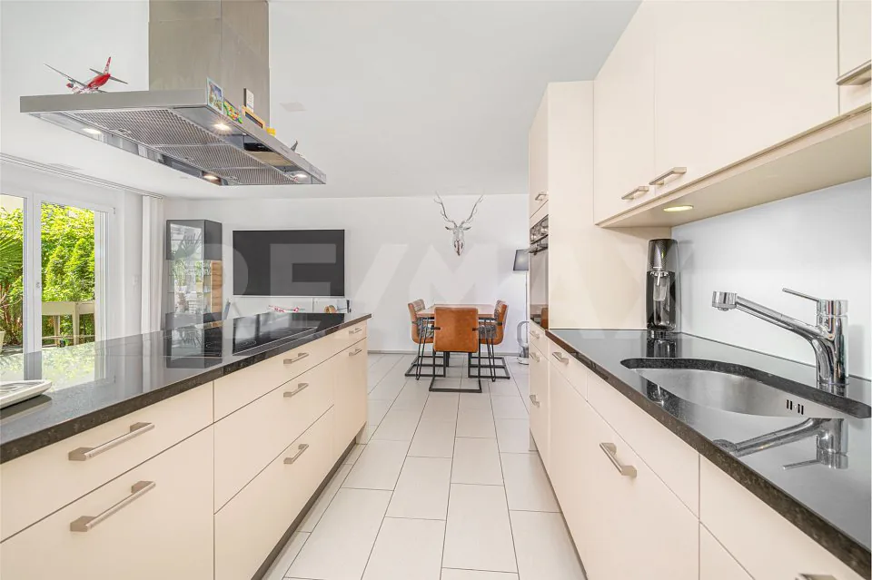 Appartement de jardin moderne, salle de loisirs et place de parking souterrain - norme Minergie !