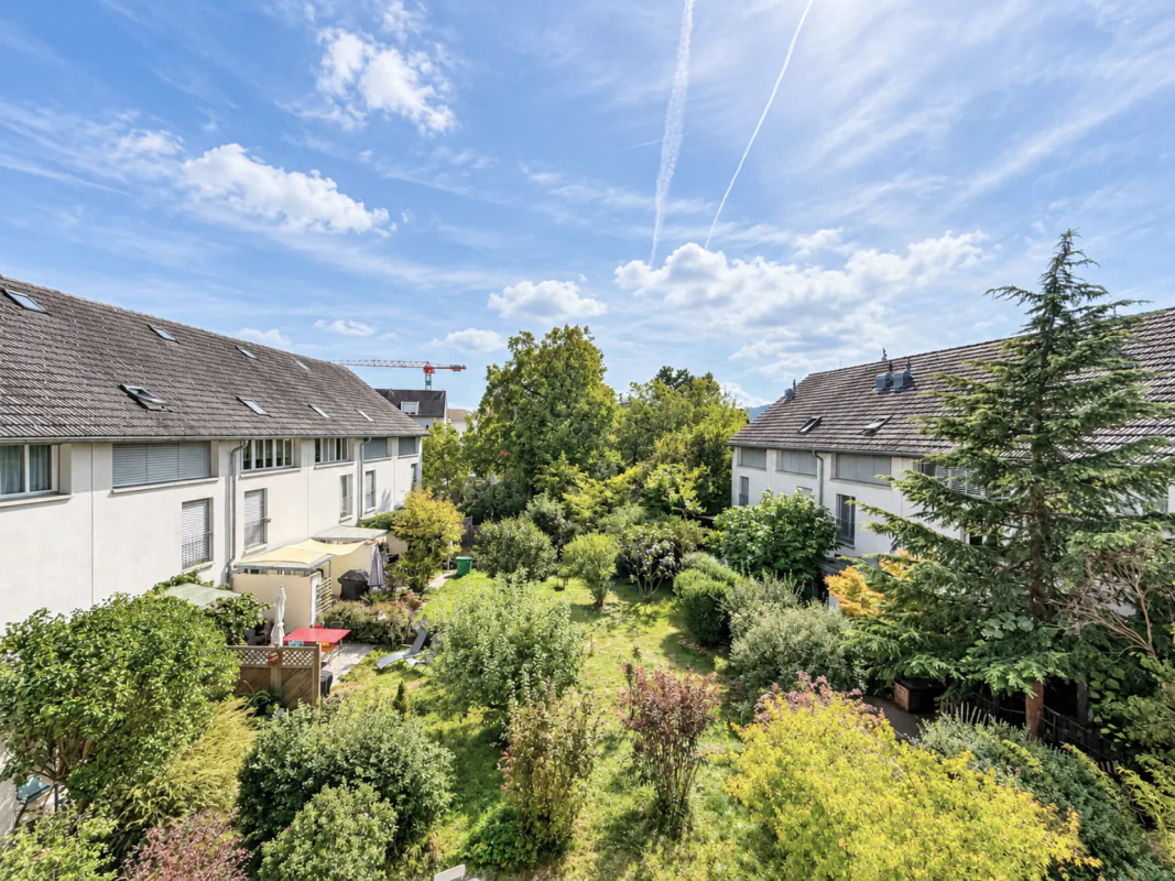 Central, quiet, sunny, and top-floor: Charming maisonette apartment with underground parking included