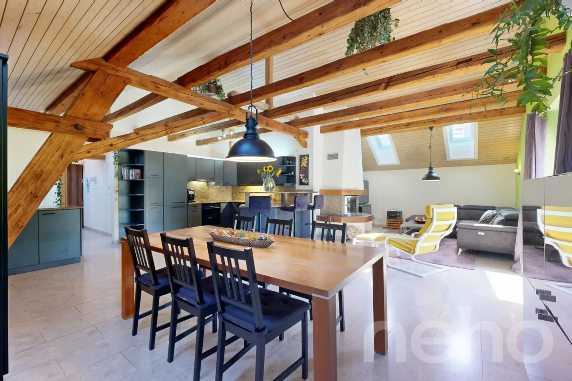 Unique attic apartment with chimney and visible beams