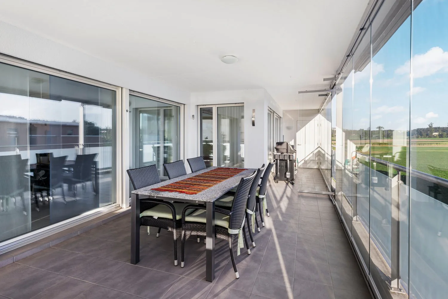 Spacious 5½-room apartment with 33 m² corner balcony and a view of the surrounding countryside